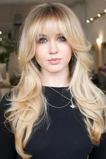 Honey Blonde Layers with Feathered Bangs