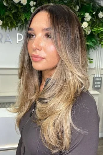 Rooted Blonde Layers with Soft Curtain Lift