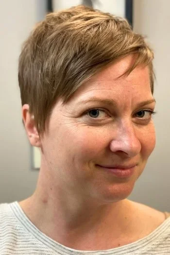 Soft Brown Pixie with Side-Swept Fringe