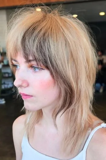 Textured Blonde Shag with Wispy Bangs
