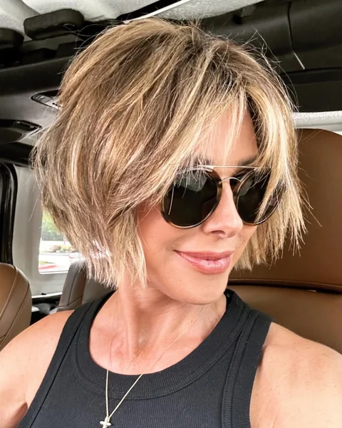 Choppy Blonde Layered Bob with Feathered Fringe