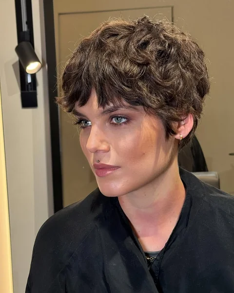 Curly Brunette Pixie with Textured Layering