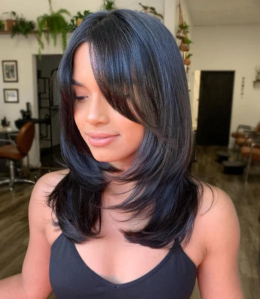 Glossy Black Layered Cut with Side Bangs