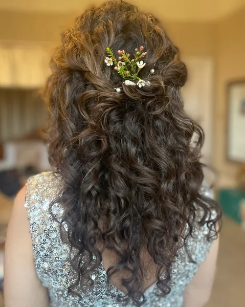Natural Curly Half-Updo with Floral Accents