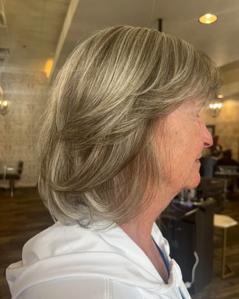 Voluminous Silver Short Cut with Blended Feathered Layers