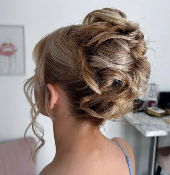 Voluminous Textured Updo: Romantic Prom Night Style