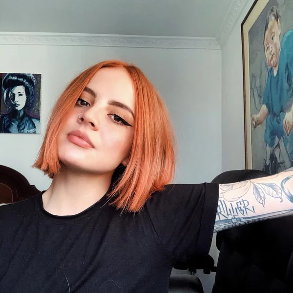 Bold Chin-Length Orange Bob for Minimal Effort
