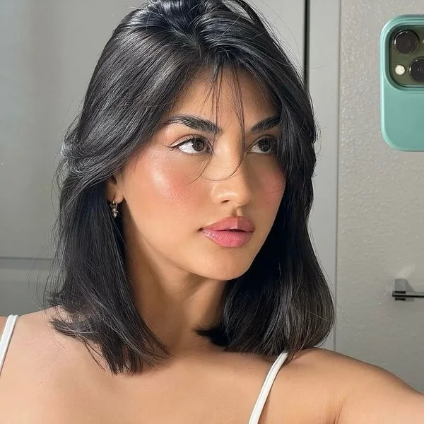 Effortless Dark Lob with Face-Framing Curtain Bangs