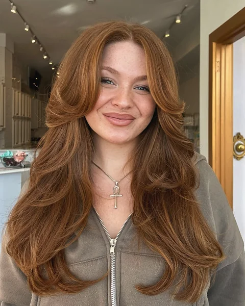 Woman having her hair combed