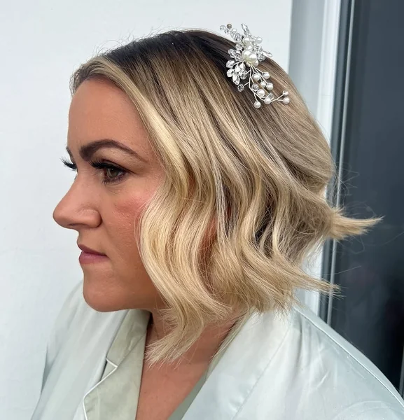 Glamorous Wavy Bob with Side-Swept Crystal Clip