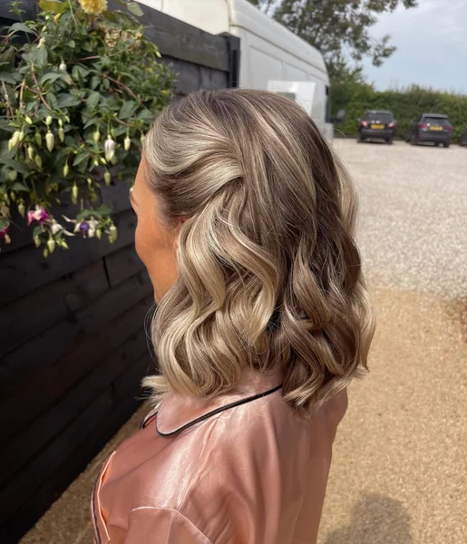 Glamorous Wavy Lob with Elegant Face-Framing Sweep