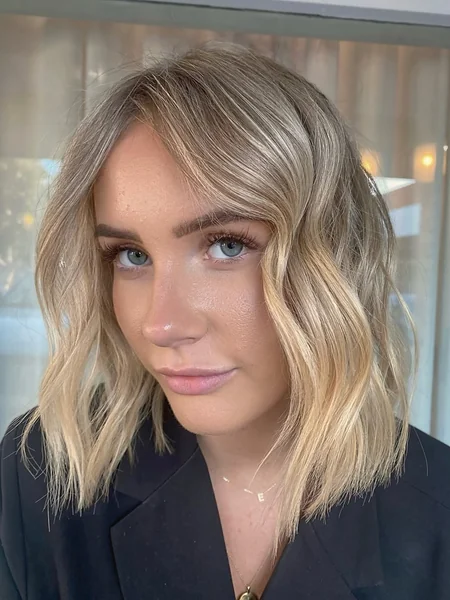 Golden Blonde Wavy Bob with Soft Layered Ends