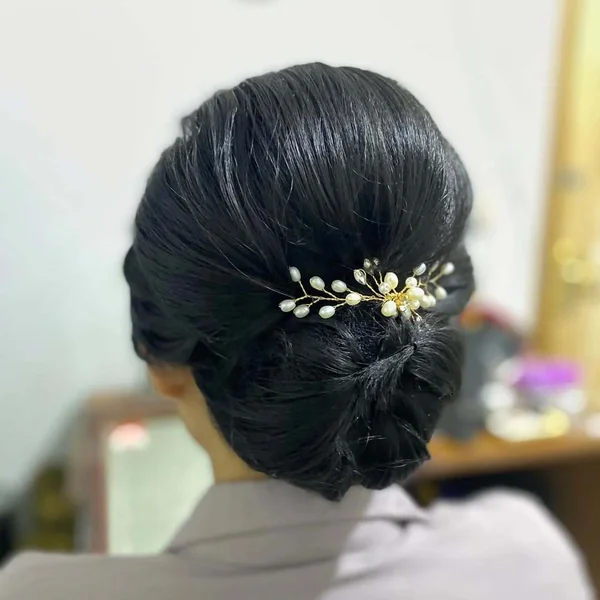 Polished Low Roll Updo with Pearl Sprig Accessory