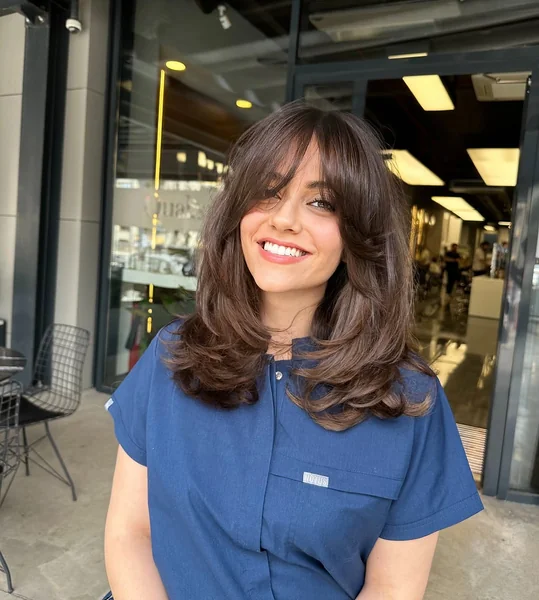 Chic Layered Brunette Lob with Wispy Curtain Bangs