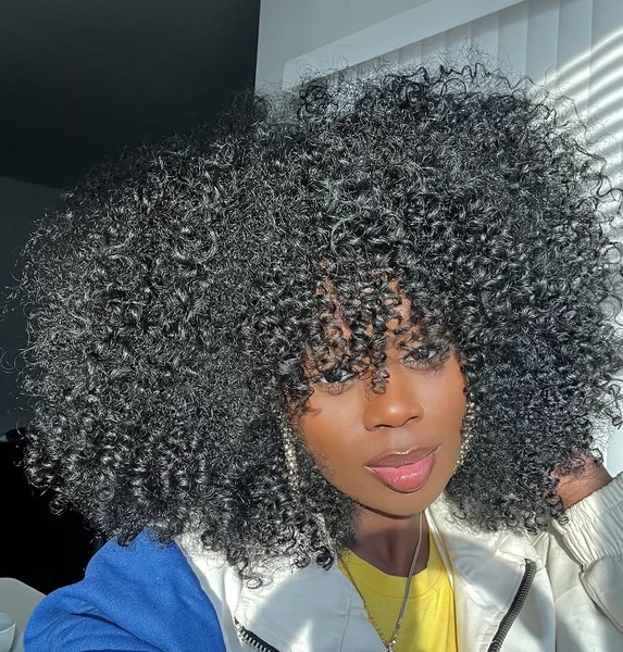 Cozy Curly Hair under a Winter Beanie