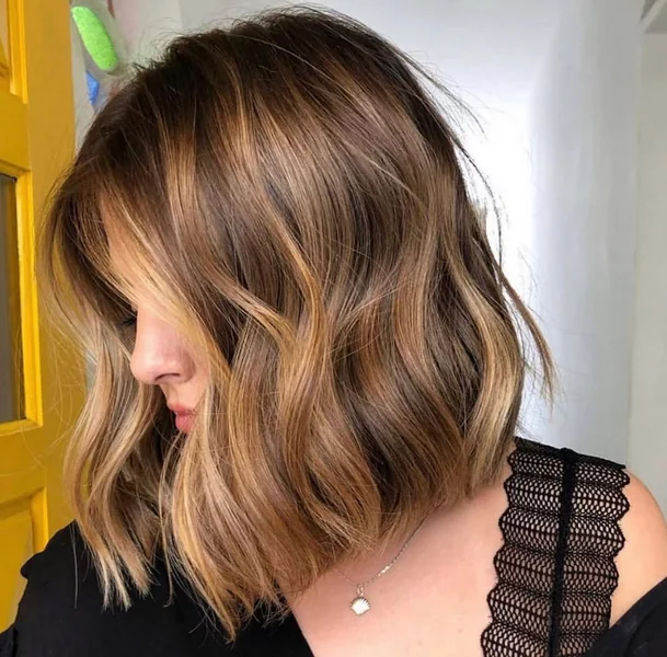 Dimensional Honey-Blonde Messy Bob with Soft Waves