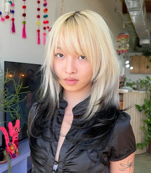 Edgy Two-Tone Wolf Cut with Wispy Bangs