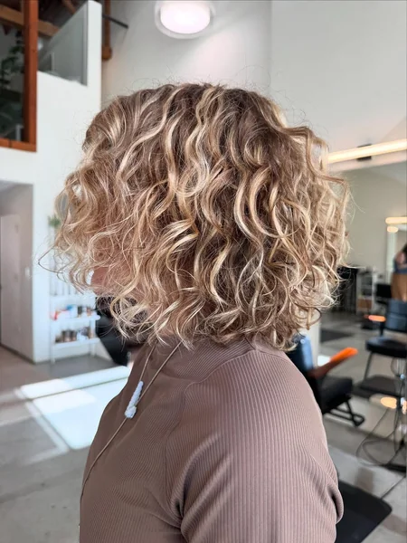 Honey-Blonde Sun-Kissed Bob with Airy Spirals