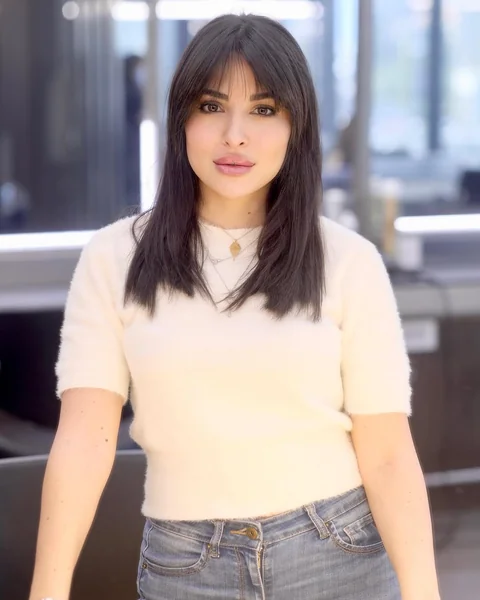 Sleek Dark Hair with Soft Layered Curtain Bangs