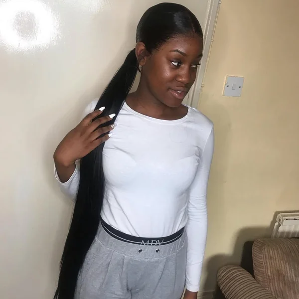 Sleek Extra-Long Black Ponytail with Polished Edges