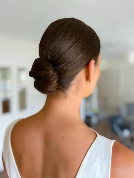 Smooth Polished Low Twisted Bun Prom Updo