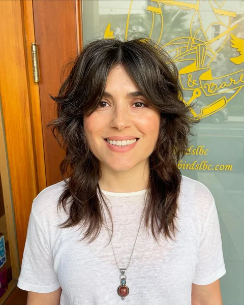 Textured Medium Shag with Face-Framing Curtain Bangs