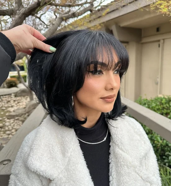 Voluminous Raven Italian Bob with Airy Full Bangs