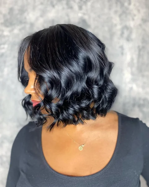 Wavy Layered Bob with High-Shine Midnight Finish