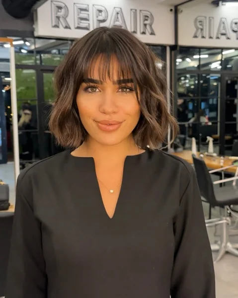 Dramatic Deep-Parted Brunette Bob with Tapered Ends