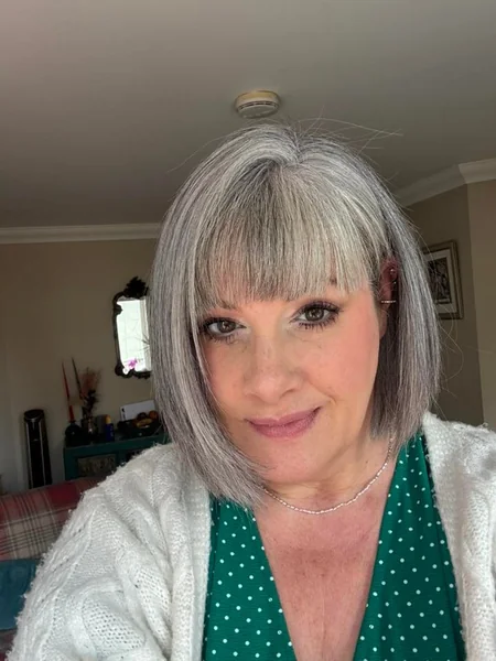 Sophisticated Silvery Bob with Full Blunt Bangs