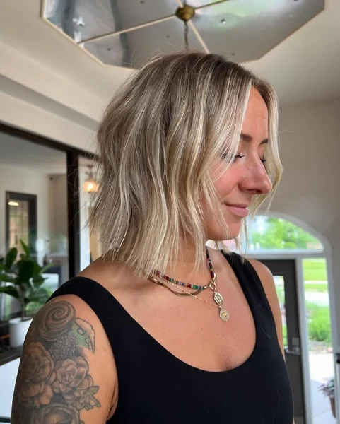 Bright Platinum Long Angled Bob with Sharp Perimeter