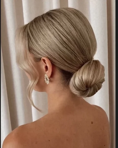 Chic Chignon with Face-Framing Waves
