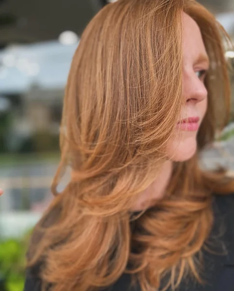 Chic Mahogany Bob with Dynamic Flicked Layers