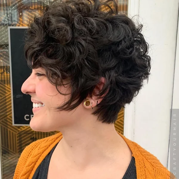 Chic Tapered Curly Pixie with Soft Side-Swept Bangs
