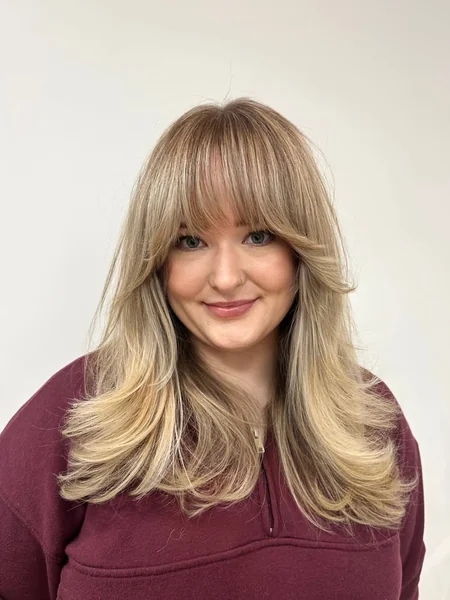 Creamy Blonde Butterfly Cut with Wispy Curtain Fringe