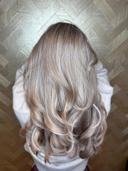 Dimensional Ash Blonde Waves with Soft Voluminous Curls