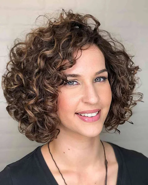 Effortless Sun-Kissed Long Pixie with Sweeping Face-Framing Layers