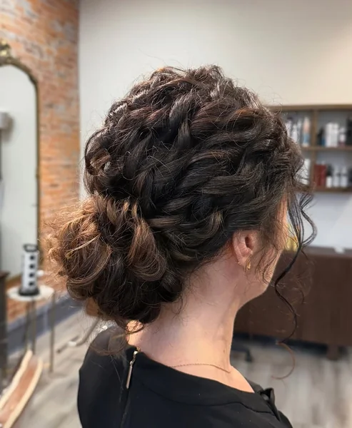 Elegant Twisted Low Updo for Thick Curls