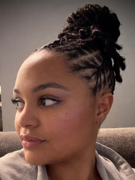 Intricate Architectural High Bun with Symmetrical Under-Braiding
