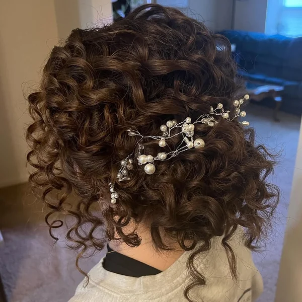 Intricate Curly Updo with Pearl Vine and Defined Coils
