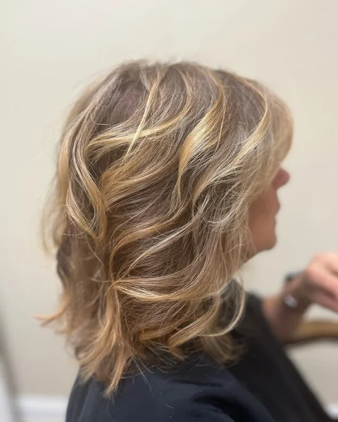 Radiant Golden Blonde Lob with Airy Ribbon Waves