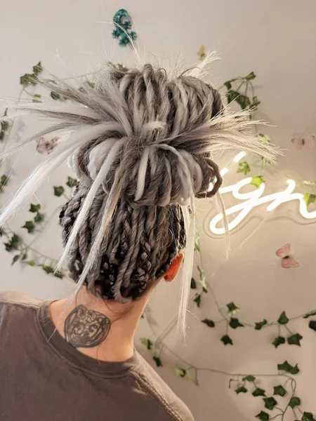 Sculpted Short Loc Bob with Twisted Parting