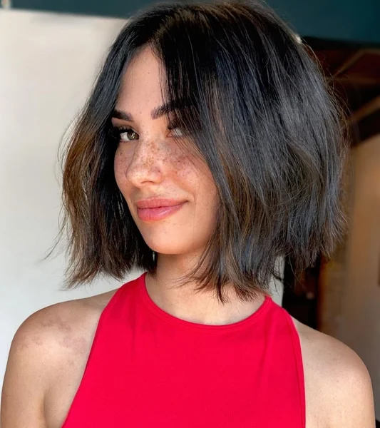 Sleek Brunette Asymmetrical Bob with Deep Side Part