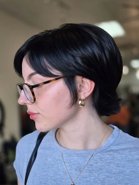 Sleek Jet Black Long Pixie with Tapered Layers