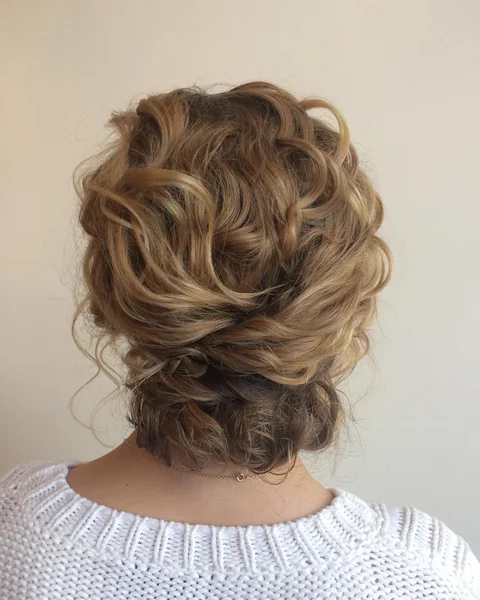 Soft Honey-Blonde Tucked Updo with Romantic Waves