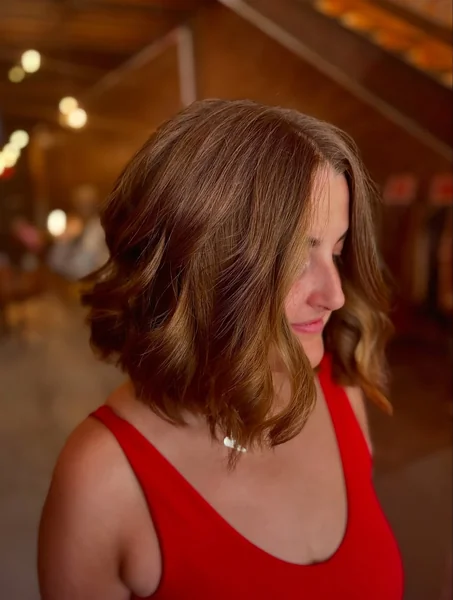 Sun-Kissed Auburn Lob with Dimensional Waves