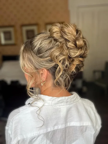 Thick Auburn Dutch Braid into Wrapped Low Bun