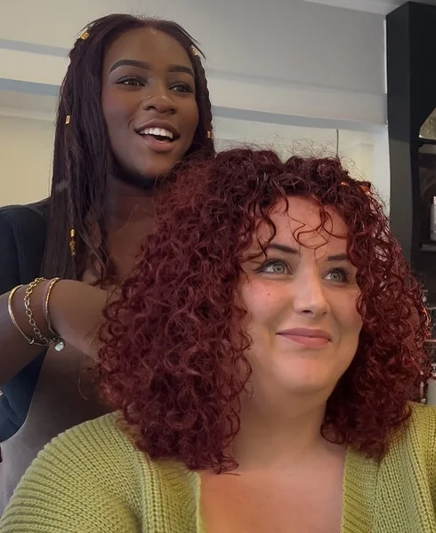 Vibrant Auburn Curly Shag with Soft Ringlet Bangs