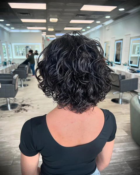 Beachy Brunette Bob with Wet-Look Defined Curls