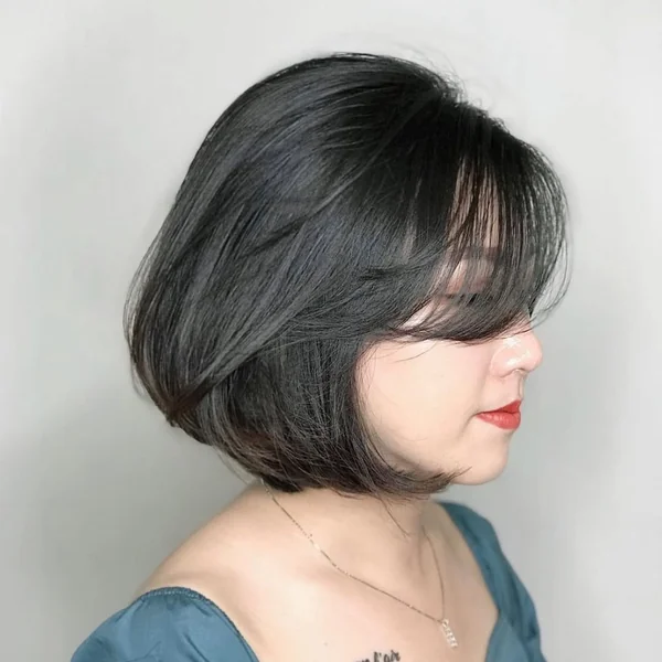 Classic Tapered Korean Bob with Side-Swept Volume